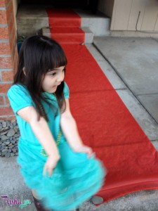 Joy loving the "red rug" outside for the Oscar Party